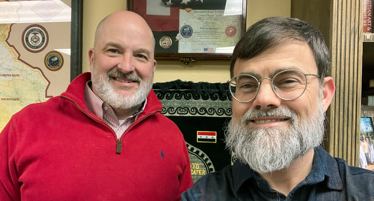 Jude Gaillot with the Rev. Blake Lasater in his office at First United Methodist Church in Eureka Springs on Dec. 13, 2022