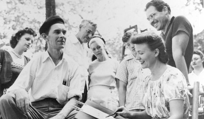 Elsie Freund sketches a portrait in Basin Park in the 1950s as
Louis Freund watches.